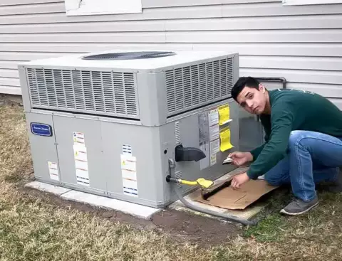 One of our technicians hard at work on an HVAC maintenance call